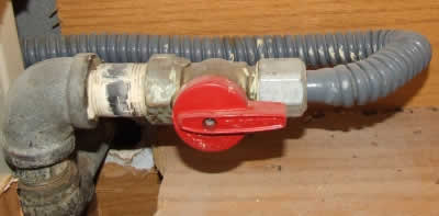 Propane gas valve and flex line in cabine