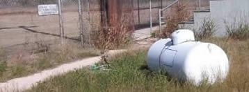 Propane tank installed in a public place, subject to tampering