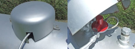 Propane regulator properly installed underneath tank dome