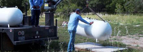 Installation of a propane tank onto a concrete pad