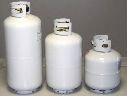 Three propane cylinders - 5 gallon, 7 gallon and 10 gallon cylinders