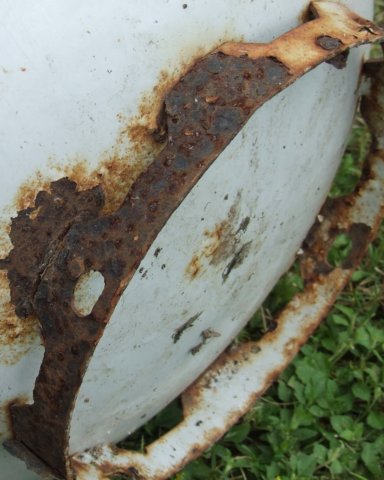 Rusted foot ring of a barbeque bottle